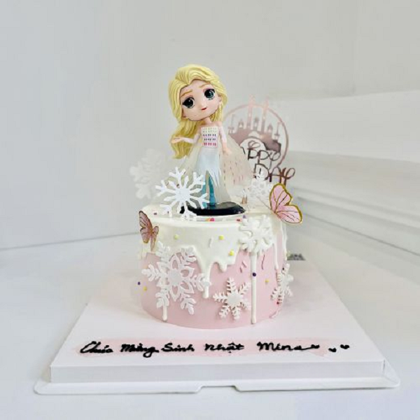 Bánh kem công chúa Elsa màu hồng với lớp socola trắng tan chảy sang trọng