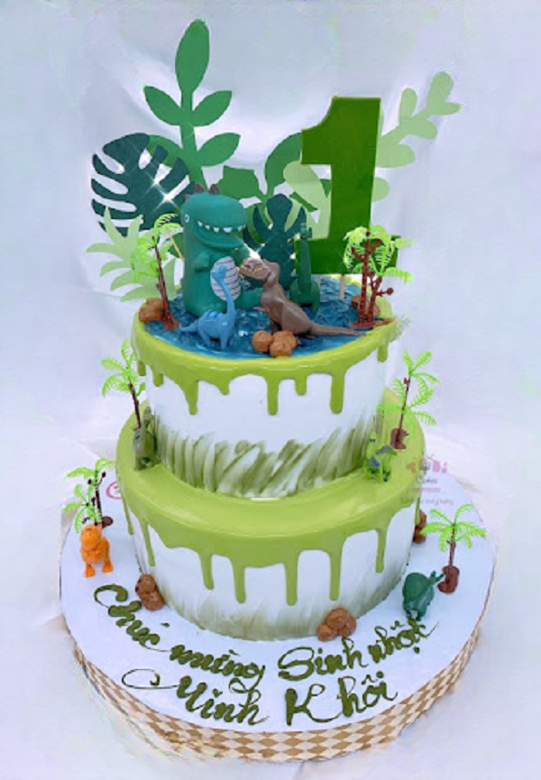 Bánh kem khủng long khổng lồ dành cho bé thích thế giới khủng long.