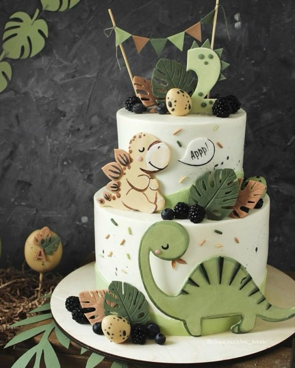 Bánh kem sinh nhật 2 tầng với khủng long, trứng và lá cây dễ thương