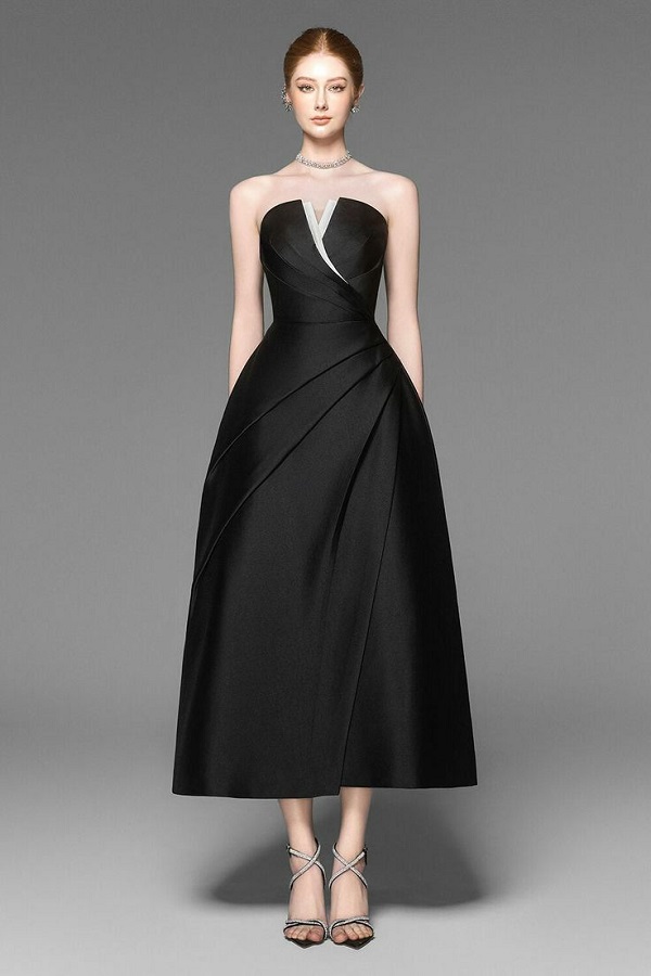 Đầm đen sang trọng quý phái xòe nhẹ nhàng, tạo cảm giác nữ tính và trẻ trung